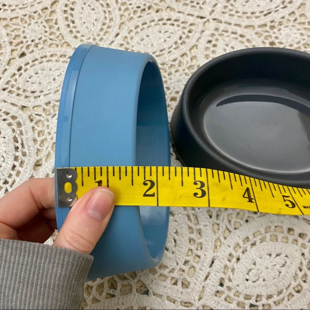 Two pet food + water bowls